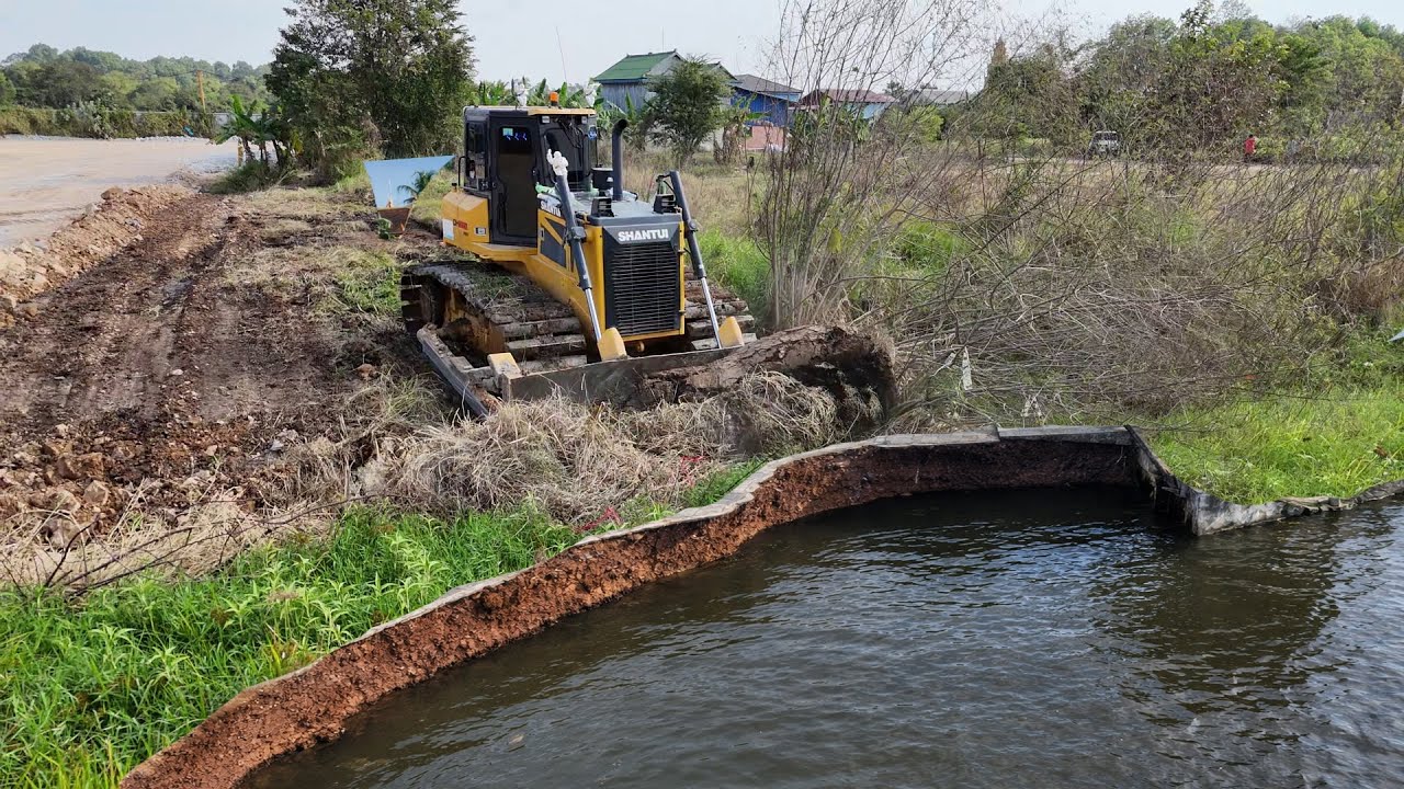 New Landfill Site Dozer DH17C3 Pushing The Soil into The Hole Building Stones Using Truck 12 wheel 