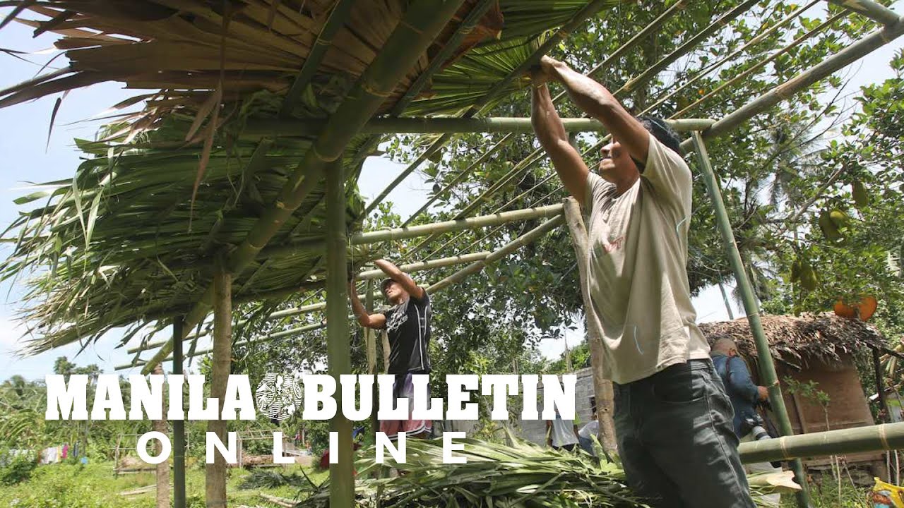 Evacuees build temporary shelters due to crowded evacuation centers