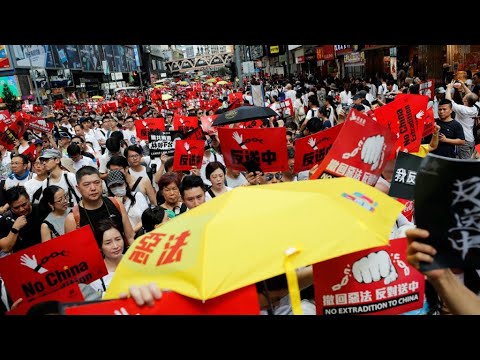 Manifestation géante à Hong Kong contre une loi facilitant les extraditions vers la Chine - Manifestation géante à Hong Kong contre une loi facilitant les extraditions vers la Chine