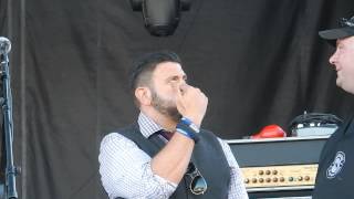 Adam Richman Trying A Burger at the Burger Battle
