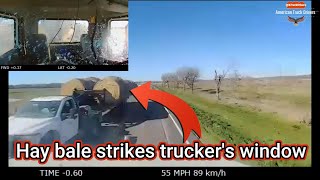 Hay bale strikes trucker&#39;s window | Ice on top of trailer flew off and broke windshield