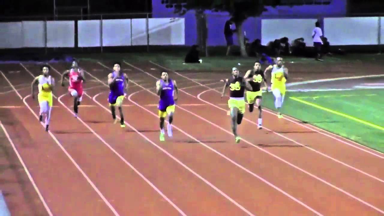 Karr's Ed Davis overtakes McDonogh 35's Jared Miles in final stride of 200 Meter District Championsh