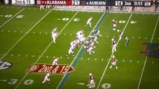 Alabama Left Tackle, Cyrus Kouandjio, slaps D-End.