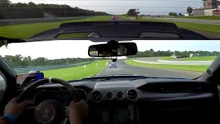 BMW drops Fluid TWICE on hardest braking zone of track, NJMP 10/1/2023