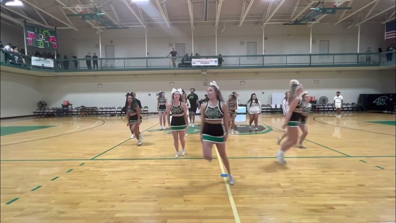Nichols college cheerleading Basketball home opener halftime