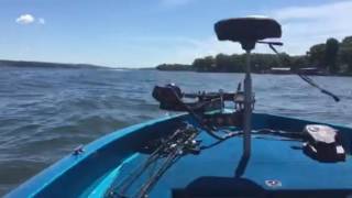 Bass boat in big waves