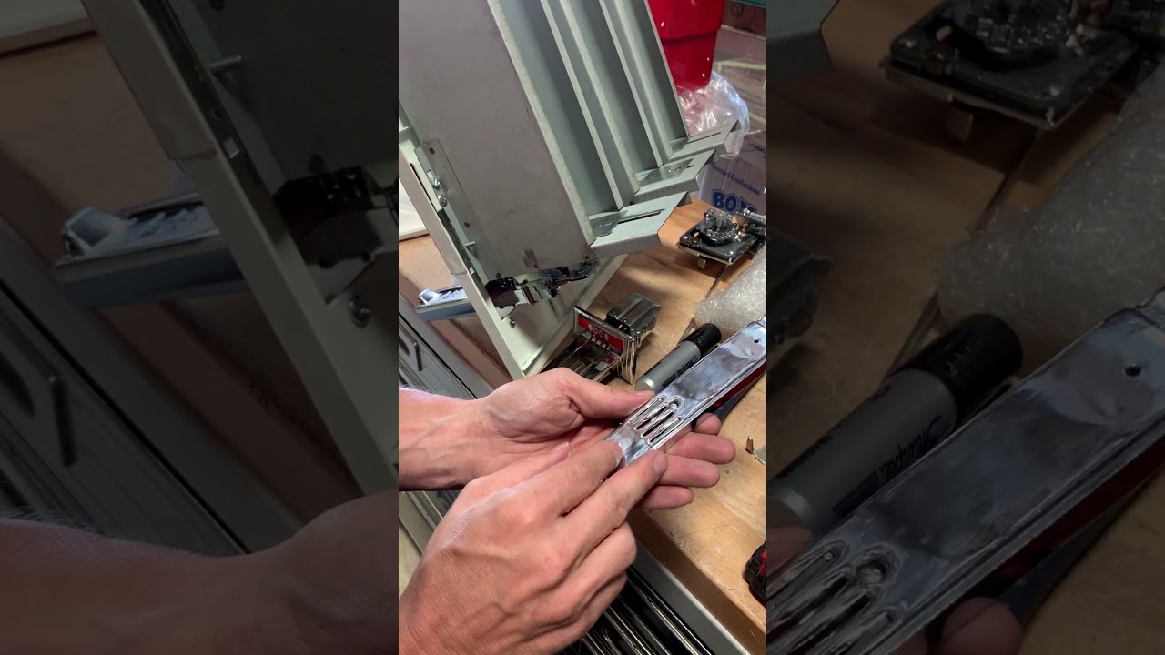 Changing vertical slide coin mechanism from 50 cents to 75 cents