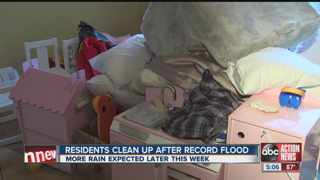 Tampa Bay area residents clean up after historic flooding - YouTube