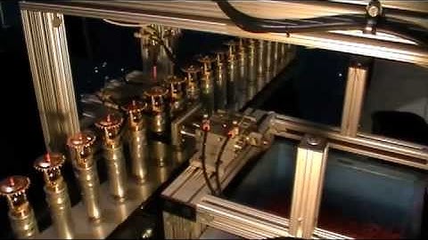 Pneumatic Product Masking Removal on a Chain-On-Edge Conveyor