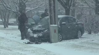 Snow cause problems on suburban roadways