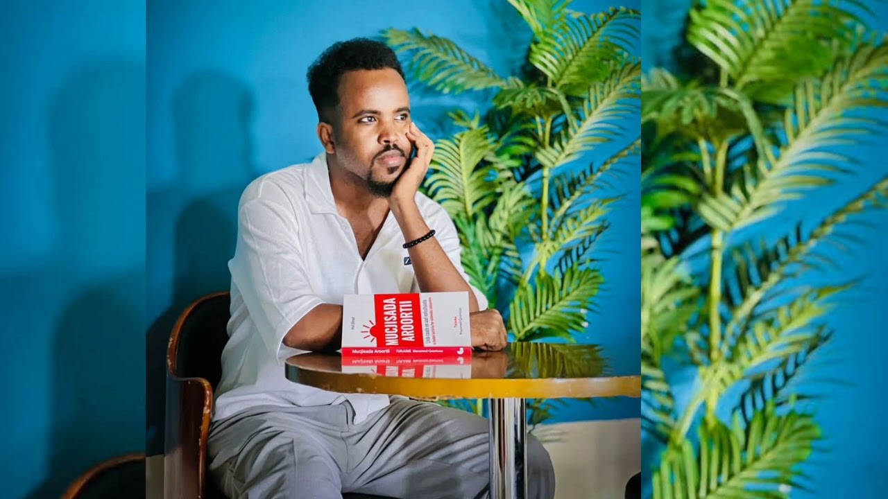 W/Q: Qoraa Maxamed Qaamuus.