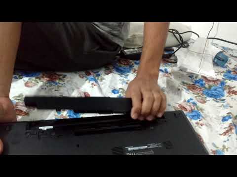 How to remove battery from dell laptop