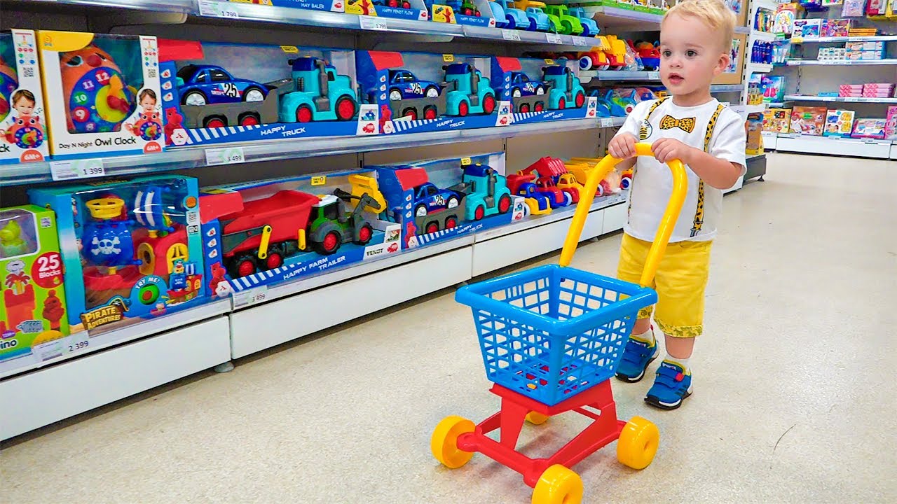 Chris and mom doing shopping in Toy store's Banner