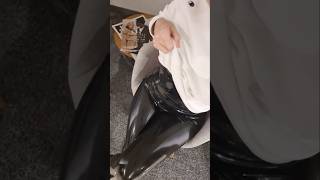 The latex catsuit worn under the clothes. Very practical for public settings.