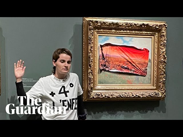 Climate activist defaces Monet painting before arrest in Paris class=
