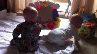 Twins playing together