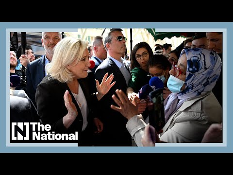 Two hijabi women confront far-right French presidential candidate Le Pen