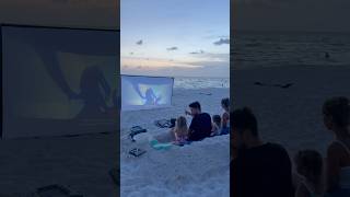 Dad Brings The Movie Theater To The Beach 