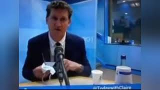 Eamon Ryan Cleaning His Glasses With A Mask