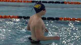Wildcat boys swimming glides by Naperville North late in the meet