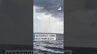 Huge waterspout forms in waters off Miami Beach