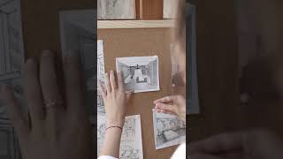 Young Woman Pinning Sketches on Pin Board, most awesome video 2021