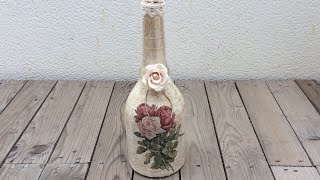 Bottle decorated with faux crakled paint and decoupage