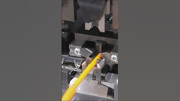 Automatic stripping and crimping machine