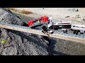 Lego trains crashing on a bridge