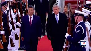 China's Xi arrives in Washington, kicking off his state visit with rare planeside welcome from Trump