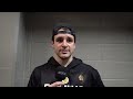 Wolanin speaks with the media following a win over Bridgeport on Friday