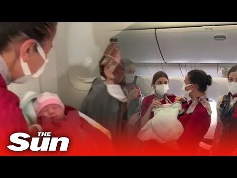 Woman from Afghanistan gives birth on evacuation flight to Britain.