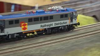 The B.M.Rly.S on OO Gauge Layout - HELJAN is, Class 86 Railfreight No.86622 with The Covered Wagons.