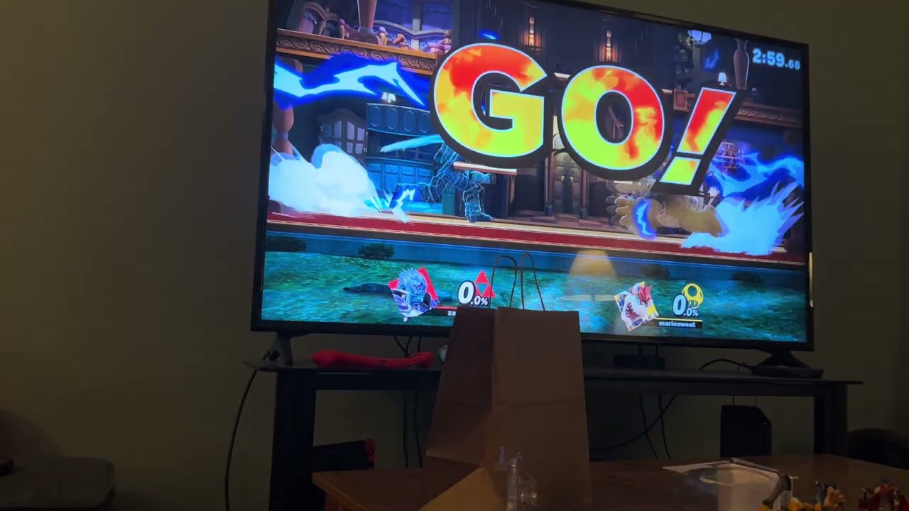 My friend playing super smash  Bros Ultimate on his TV
