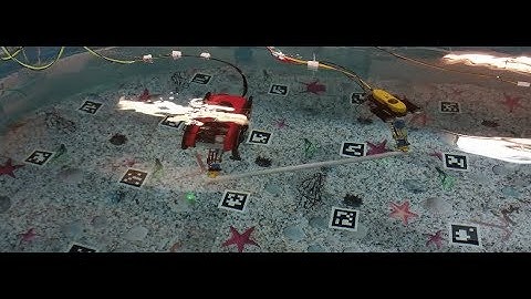 Predictive Control Approach for Cooperative Transportation by Multiple Underwater Vehicle Manipulato
