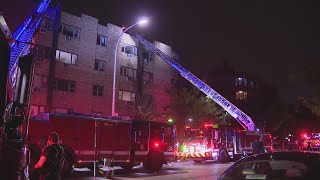 2 people rescued from 4th floor in South Shore apartment building fire, cause under investigation