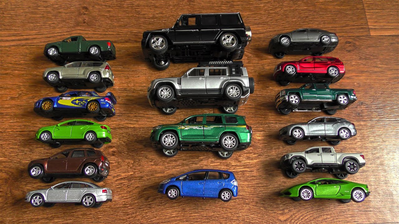 Cars in Hands With Brands and Logos