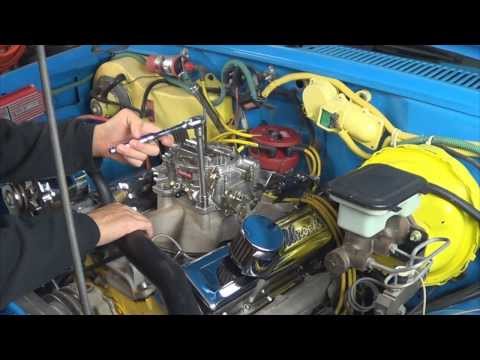 Video: Hvordan installerer du en karburator på en Chevy 350?