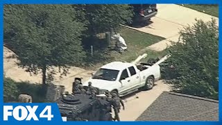 Man arrested for shooting at police, code compliance crew over unkept lawn