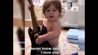 Baby singing “You Are My Sunshine”.