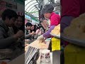 Esta es tu señal para ir a comer fideos cortados a cuchillo en el mercado de Gwangjang en Seoul