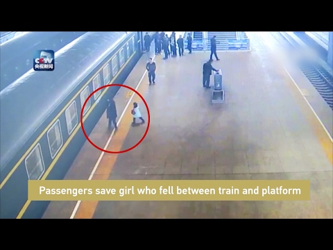 Passengers save girl who fell between train and platform