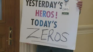 Health care workers protest vaccine mandate at the State House