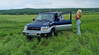 Car Stuck In Tall Gr Cranking Offroad Spinning Wheels