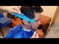 Corte de pelo con tijera en cabello ondulado