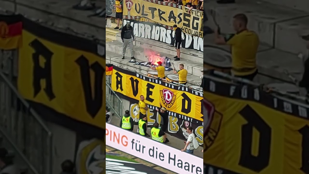 Dynamo Dresden Fans verbrennen Arminia Bielefeld Zaunfahne 