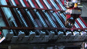 Robotic Press Assembly System - Compass Automation