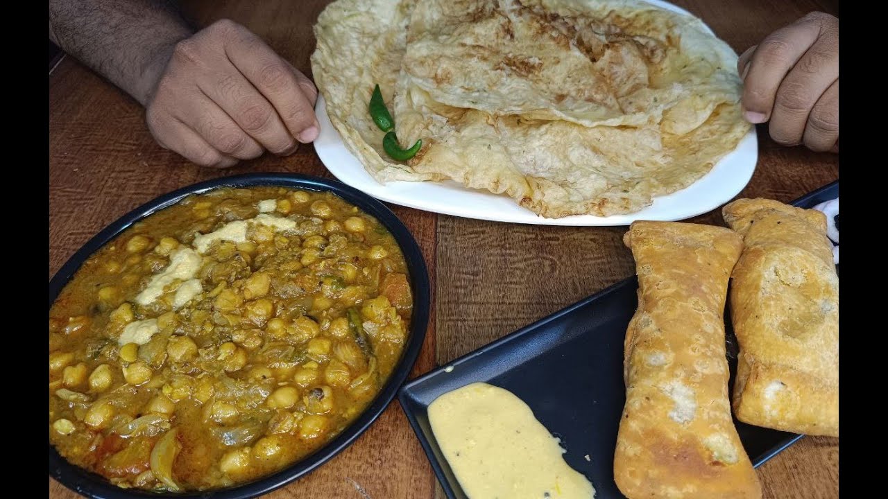 EATING CHOLE BHATURE PANEER ROLL WITH COCONUT CHUTNEY. YouTube