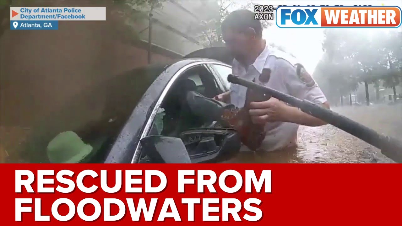 Atlanta Police Officers Rescue Man Trapped In Car By Floodwaters