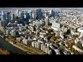 Aerial Footage / The city of Courbevoie including the business district of Paris la Défense